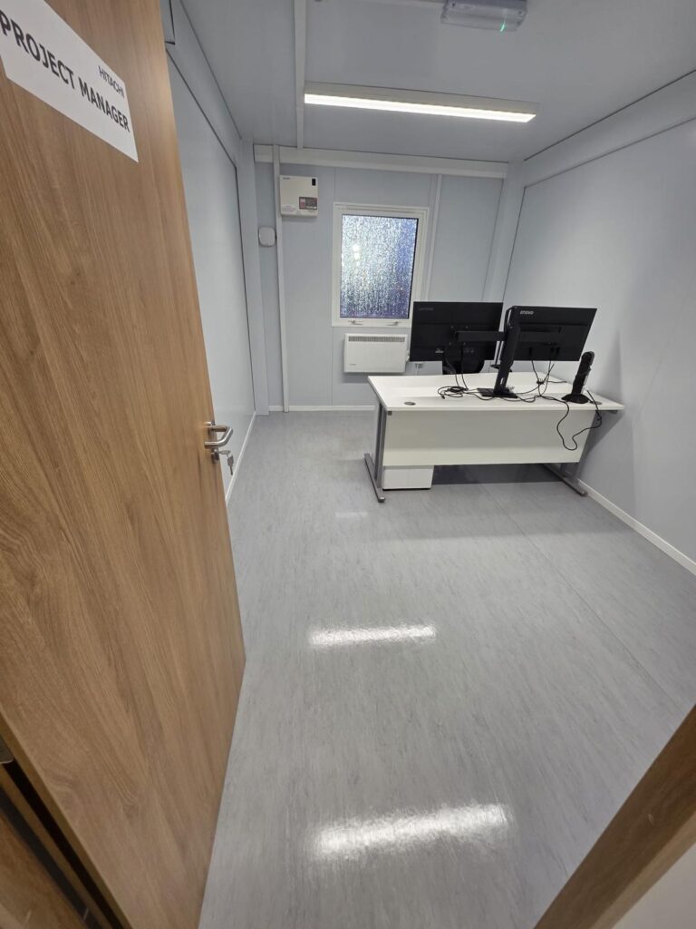 Post-construction office cleaning inside a construction site cabin in Dublin, professionally cleaned workspace ready for handover