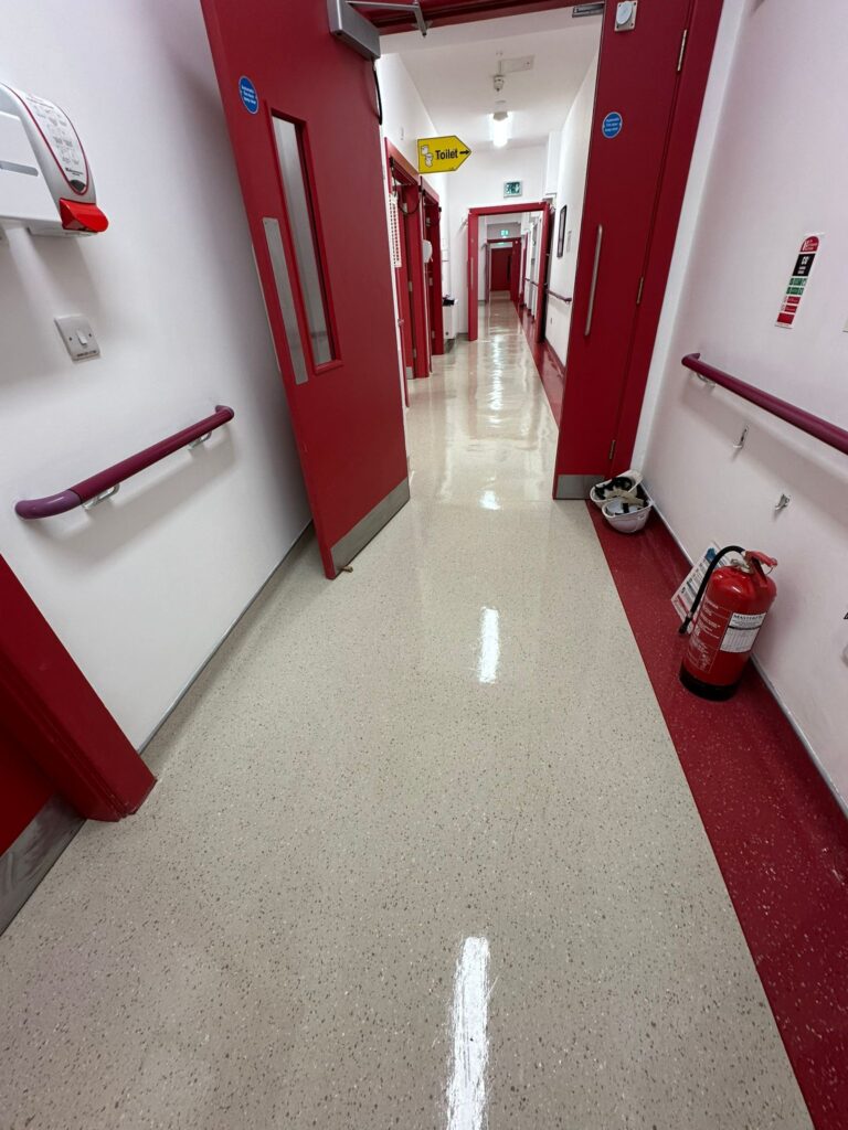 Polished hospital corridor floor after post-construction cleaning in Ireland