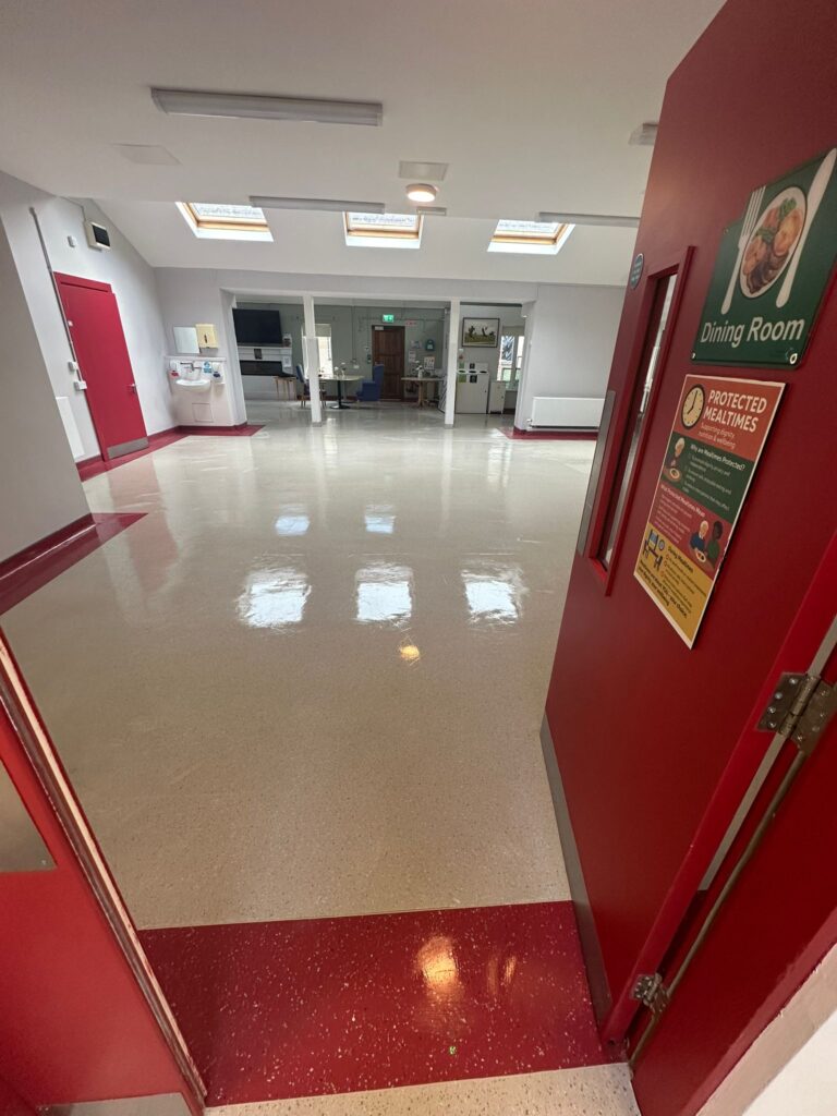 Sparkling clean healthcare facility dining room with polished floor after post-construction clean Ireland