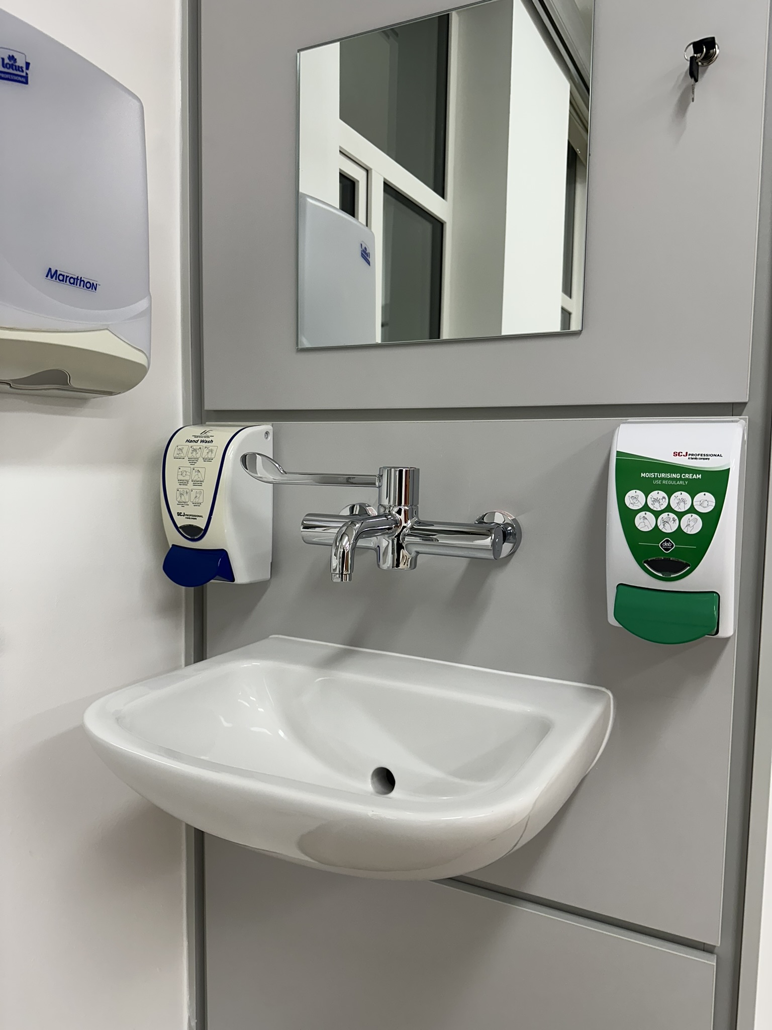 Cleaned sink and hand hygiene station after post construction clean Baltinglass Community Hospital