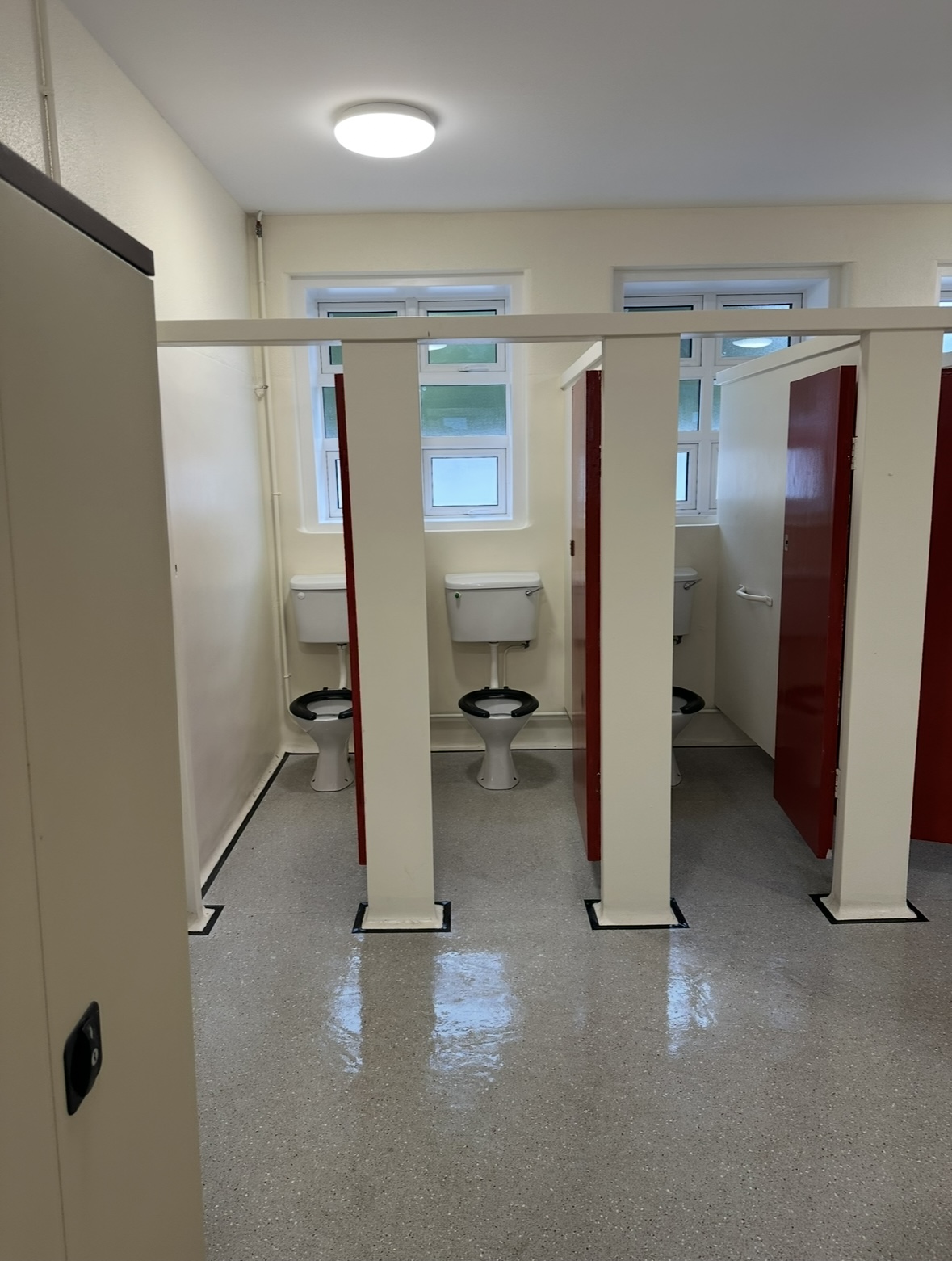 School toilets sparkle cleaned and floor buffed after construction
