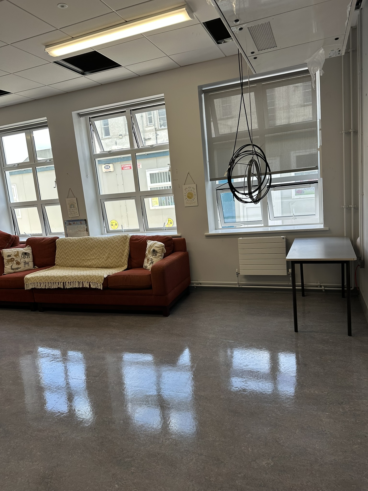 Shining classroom floor after post construction deep clean