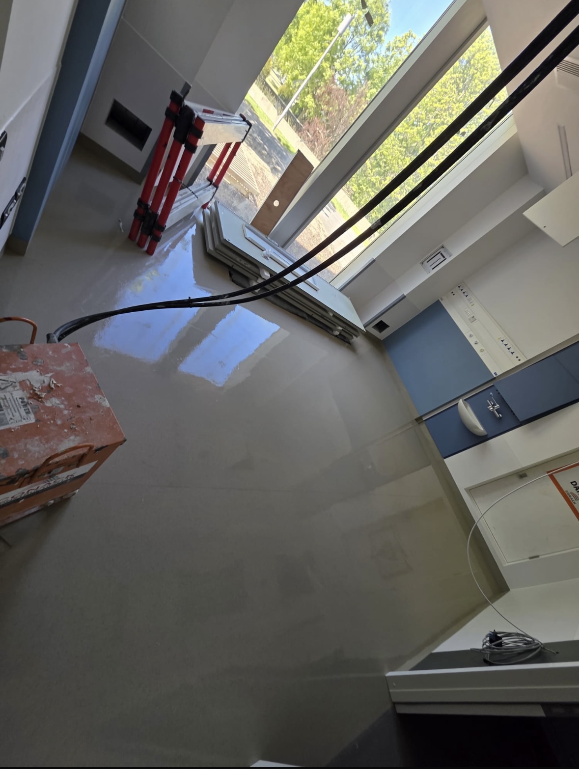 Hospital room floor cleaned during builders clean with construction equipment St Vincent's Hospital