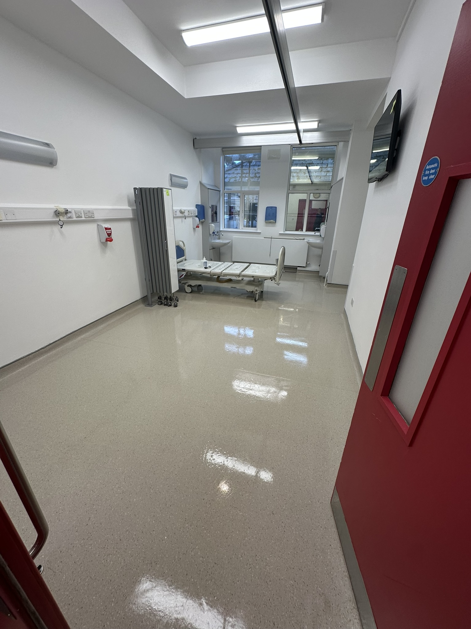 Hospital patient room with polished floor after builders clean at Baltinglass Community Hospital
