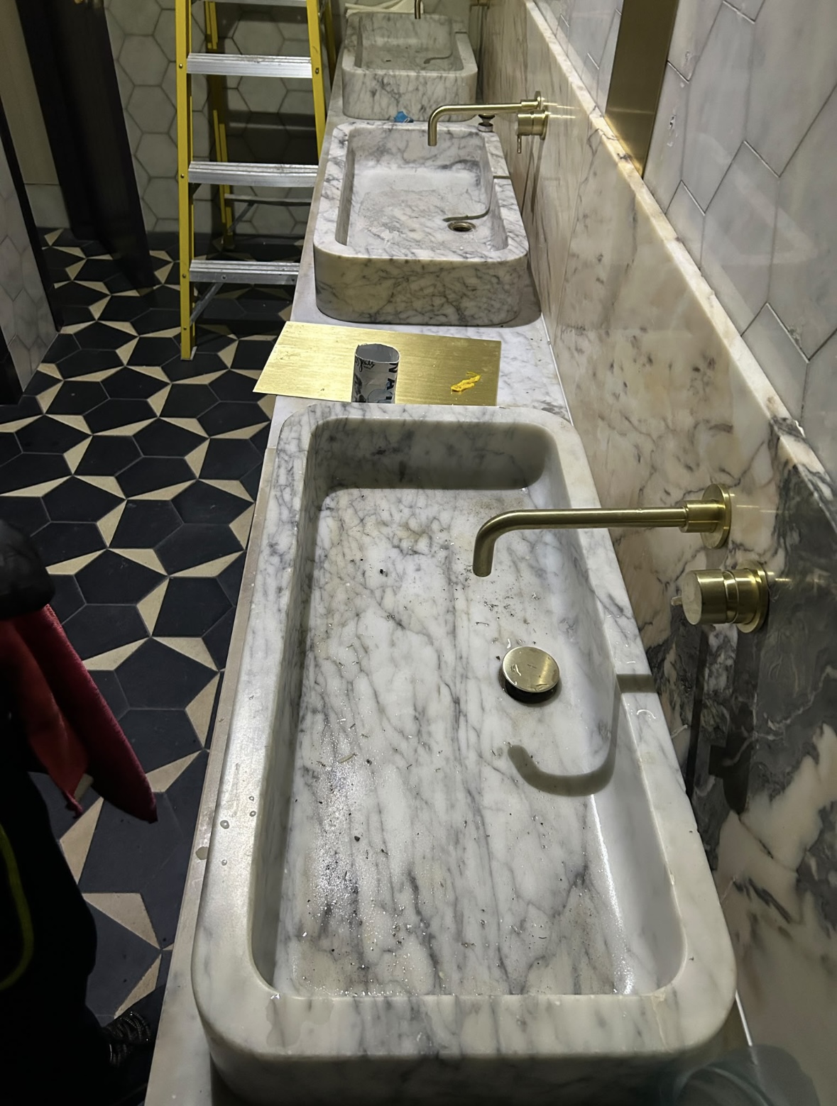 Marble sink detail cleaning in progress Sophie's Rooftop Dean Hotel