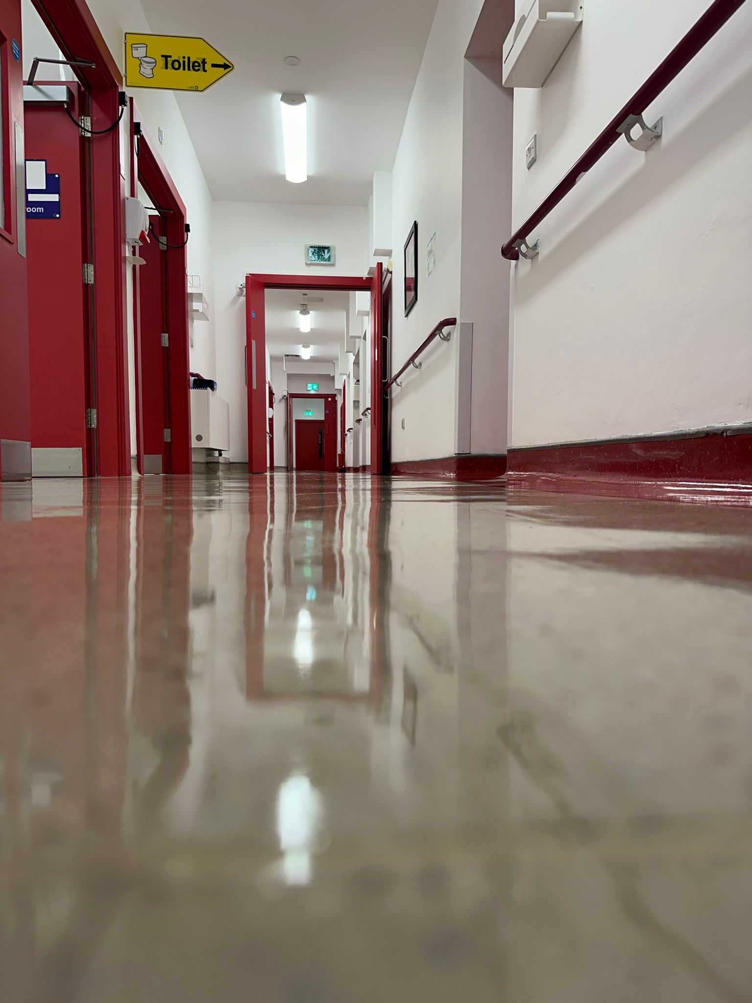 Hospital corridor with mirror finish floor after builders clean at Baltinglass Hospital