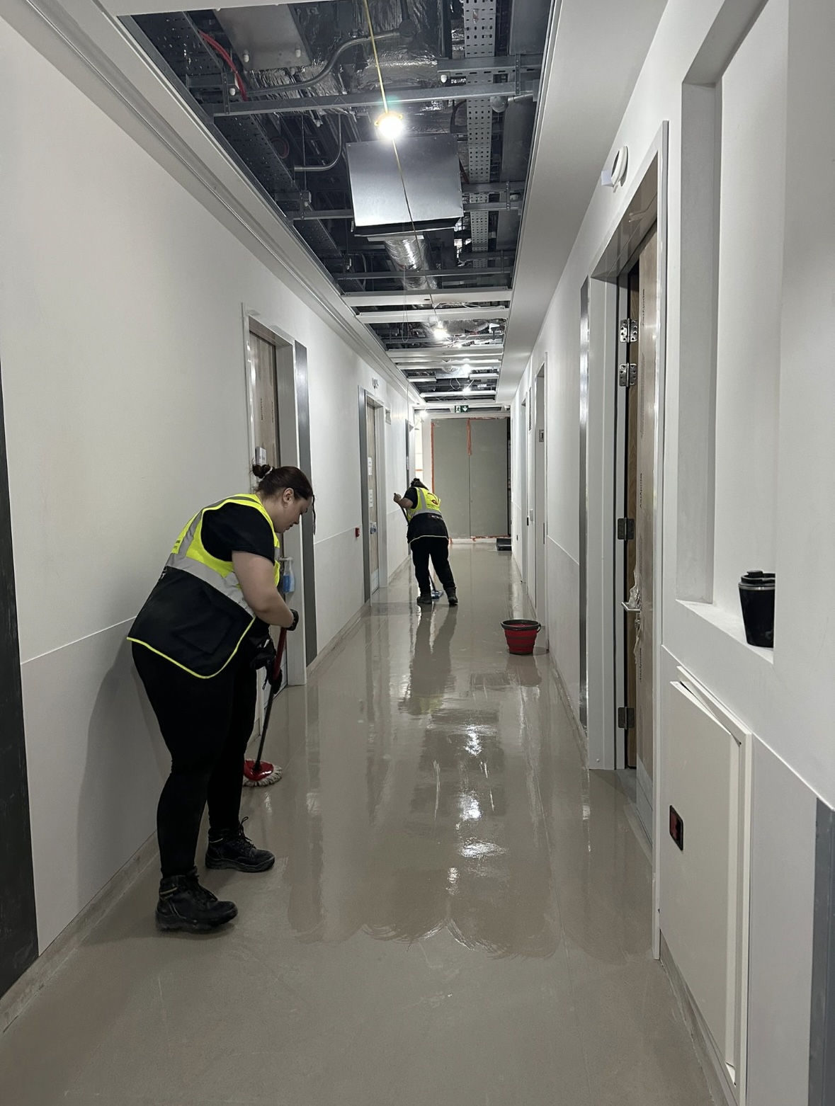 Hexaclean Solutions team mopping new build hospital corridor at St Vincent's Hospital