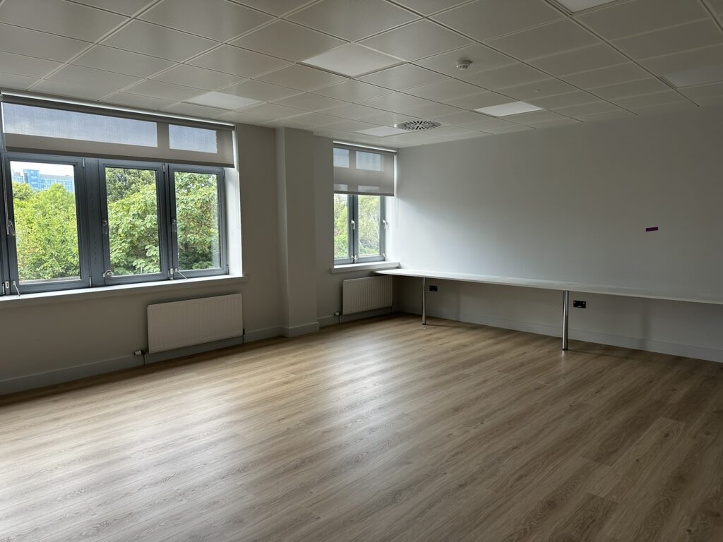 Finished office after office fit out cleaning in Sandyford, with cleaned flooring, windows, work surfaces and newly completed interior.