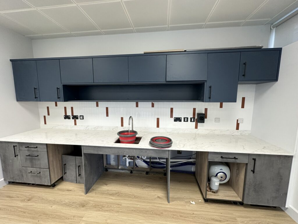 Office fit out cleaning in Sandyford showing the newly fitted office kitchen and worktop during post-construction cleaning.